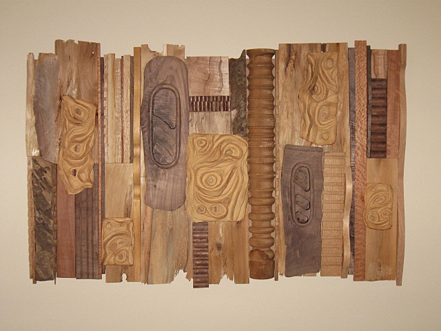 wood and clay wall piece