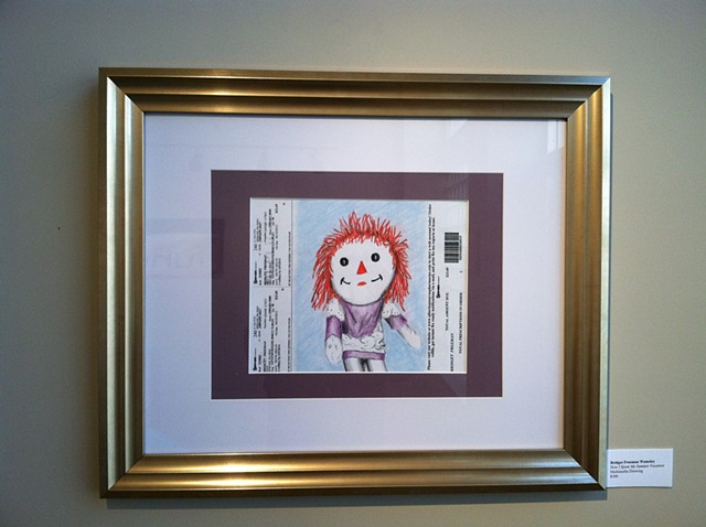 Raggedy Ann image sandwiched between lines of prescription information.