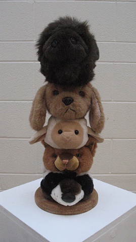 Totem pole of stuffed animal heads