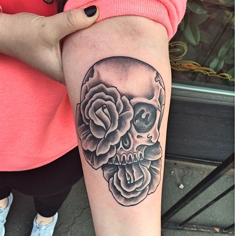 Skull and rose tattoo by Dirk Spece at Gold Standard Tattoo in Bend, OR.