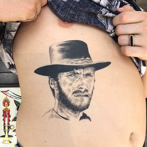 Clint Eastwood tattoo by Dirk Spece at Gold Standard Tattoo in Bend, OR.