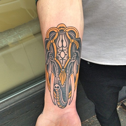 Charging elephant tattoo by Dirk Spece at Gold Standard Tattoo in Bend, OR.