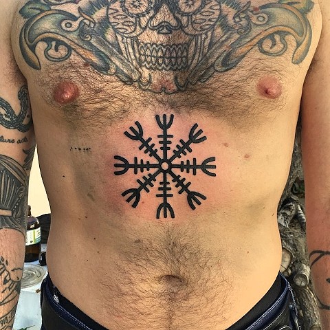 Norse compass tattoo by Kc Carew at Gold Standard Tattoo in Bend, OR.