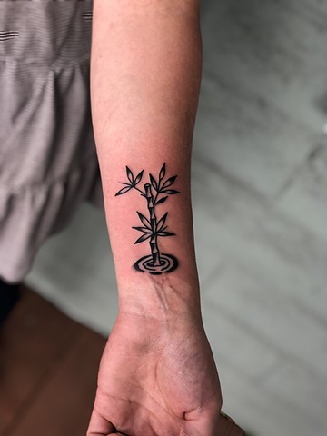 Bamboo wrist tattoo by Kc Carew in Bend, Oregon