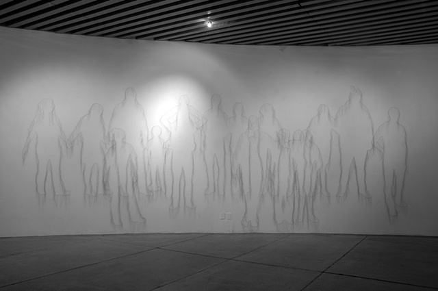 Art installation of life size figures drawn with human hair and pins