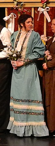 Beatrice in her aqua dress with double layer of lace trim and matching ruffle.