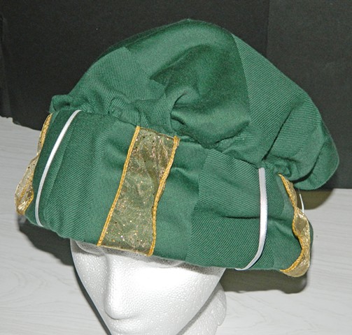 Forest green Renaissance hat with gold and white accents.