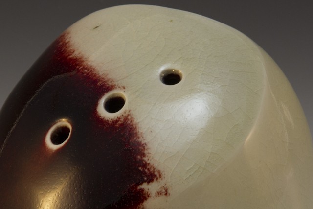 Ceramic Vase. Porcelain, red glaze.  By Carol Naughton Ceramics