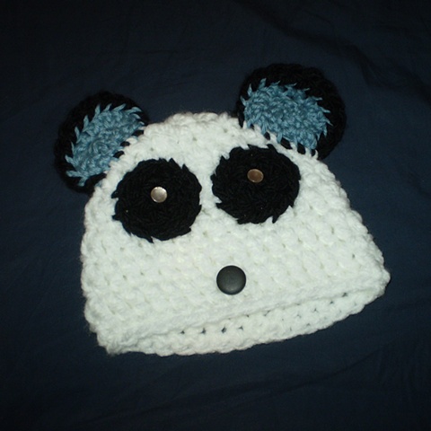 hand-crocheted panda baby hat