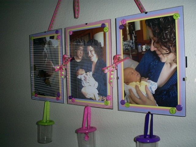 decorated clip frame with newborn baby pics by ashley seaman