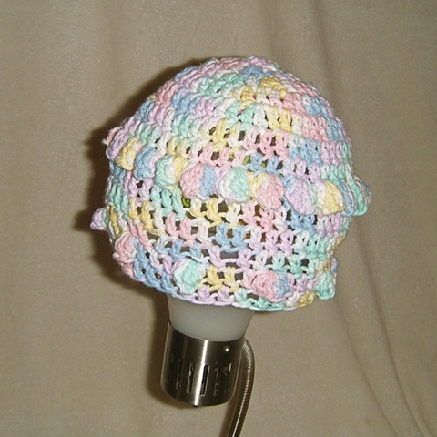 hand-crocheted popcorn pattern baby hat by ashley seaman