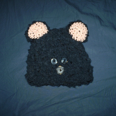 hand-crocheted bear baby hat