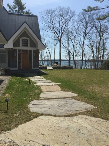 Giant heritage valley stepping stones welcome you to the entrance of this sea side home.