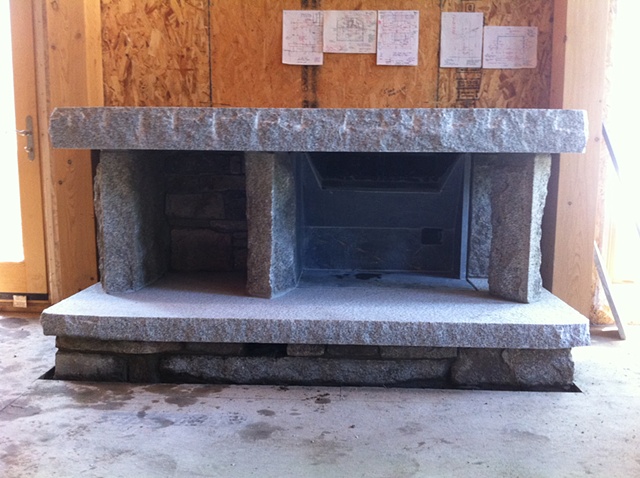 inside fireplace, granite with inlaid soapstone fire box