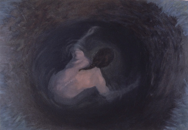 nude man seen from above in a hole full of water