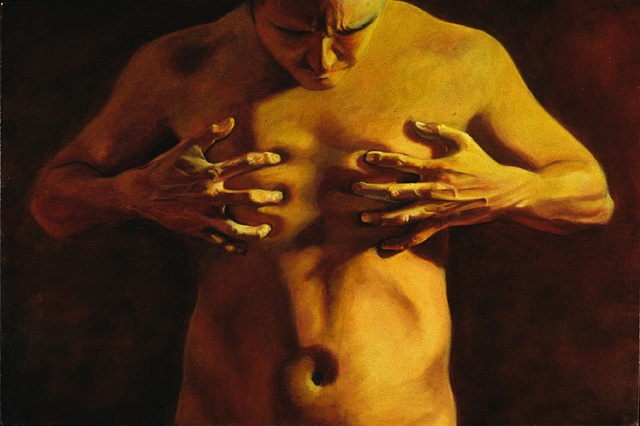 Torso view of a nude man with hands on chest