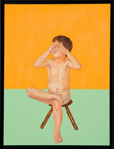 young boy sitting on wooden stool looking at viewer through fingers