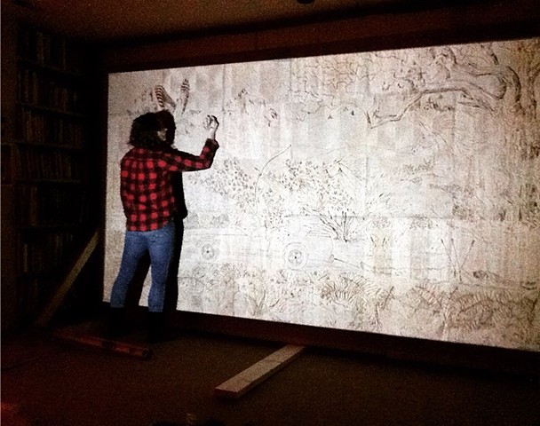 Projecting and tracing my drawing onto the panels to be carved