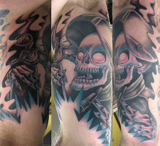 Peter McLeod Tattoo Welding skull tattoo