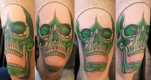 Peter McLeod Tattoo green skull tattoo
