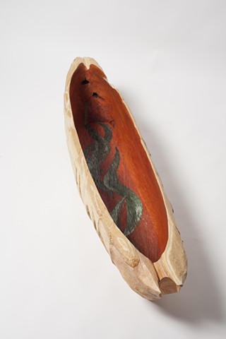 Carved cedar boat sculpture by Lin Lisberger