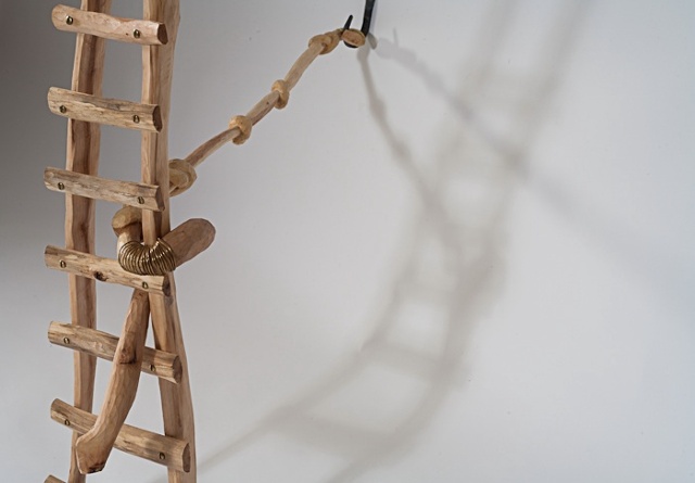 Wood sculpture of ladder and knots by Lin Lisberger