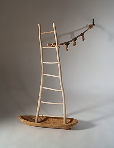Wood sculpture of boat, ladder and knots by Lin Lisberger