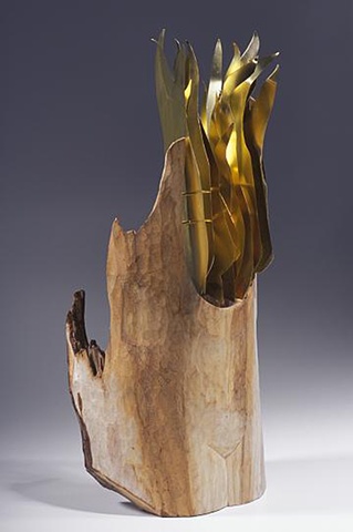Wood sculpture about hot flashes by Lin Lisberger