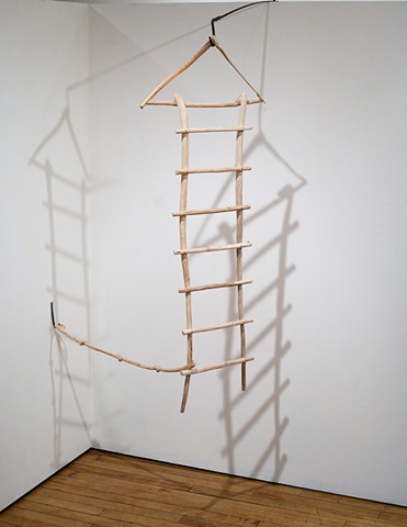 Wood sculpture of ladder with carved knotted rope by Lin Lisberger
