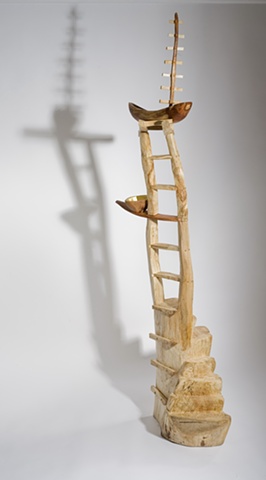 Wood sculpture of ladders and boats by Lin Lisberger
