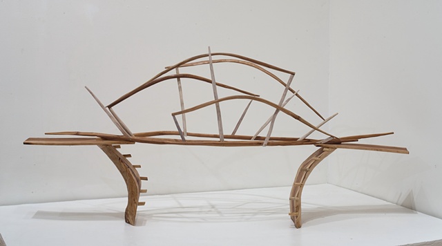 Wood sculpture of bridge and carved knots by Lin Lisberger