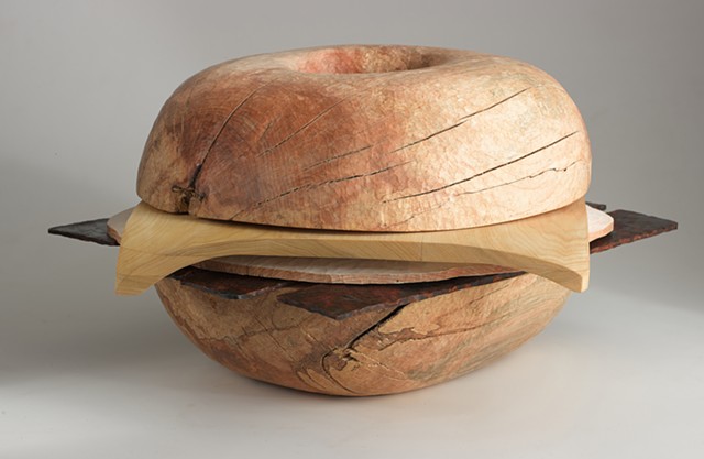 Carved wood sculpture about sandwiches by Lin Lisberger