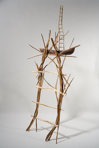 Wood sculpture of ladders and boat by Lin Lisberger