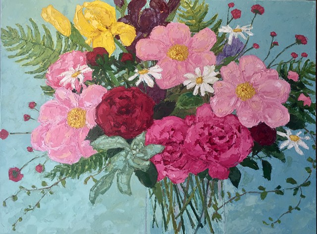 Pink peonies with mixed flowers on blue