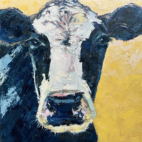 Cow portrait interpretting in the University of Michigan Maize & Blue