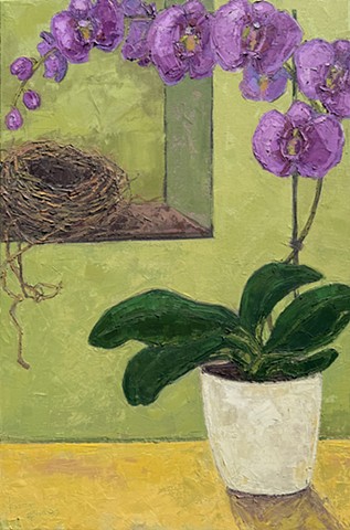 Magenta Orchid and empty bird nest in a still lifer