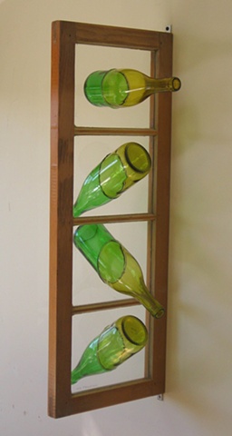 recycled bottles in old sash