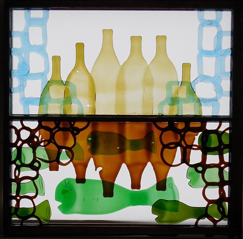 bottle glass in an old window.