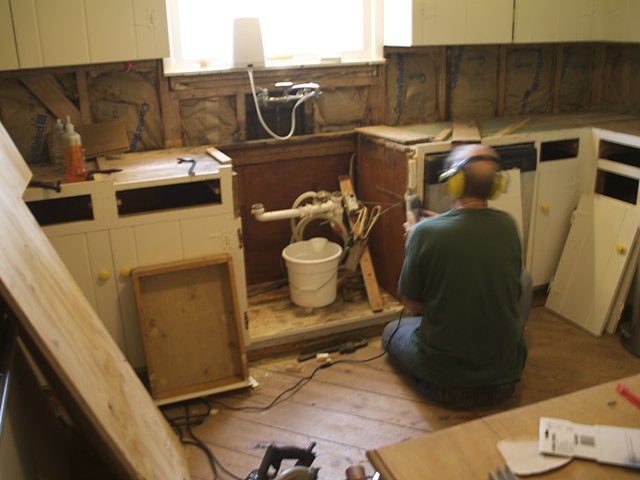 Tim returns from the North and removes the sink and begins carpentry work.