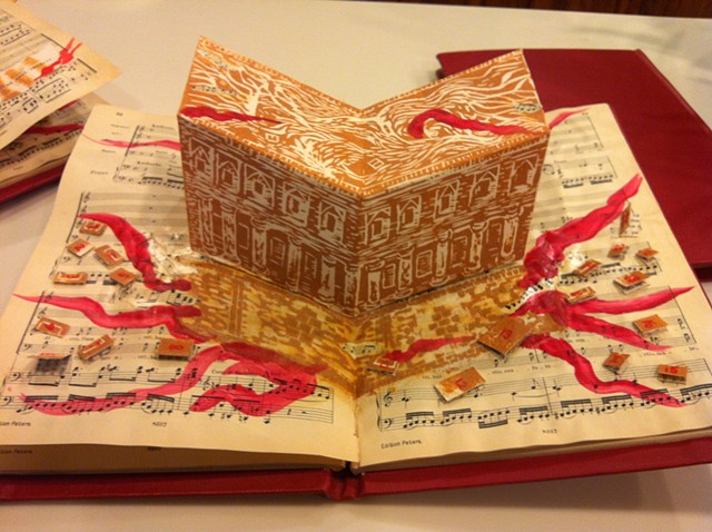 This altered book was created, as an edition of three, for the "Al-Mutinabbi Street Starts Here" book arts show.
