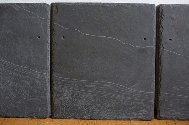 Wave Hill contour lines engraved into Slate