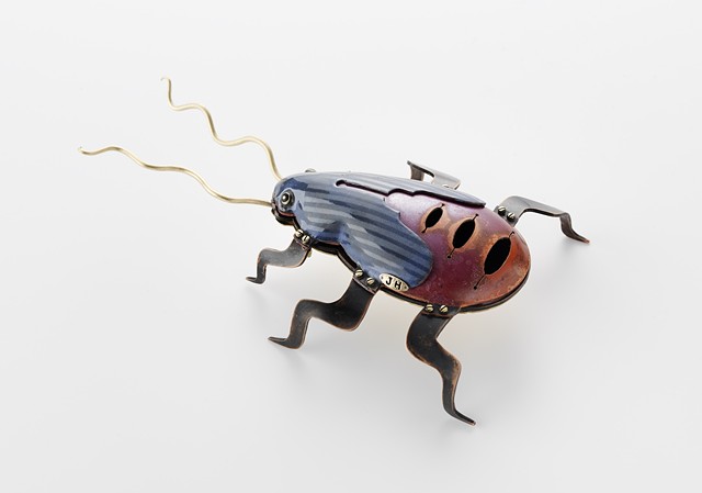 stylized version of a red-shouldered bug inspired by ones seen on camel trek in South Australia