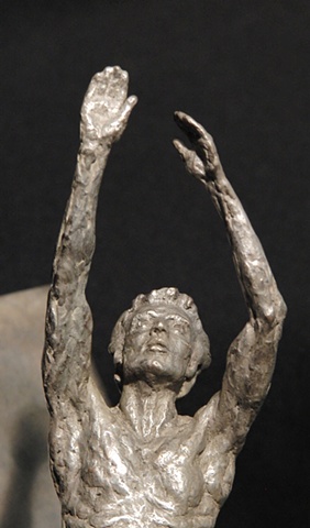 male moving figure sculpture