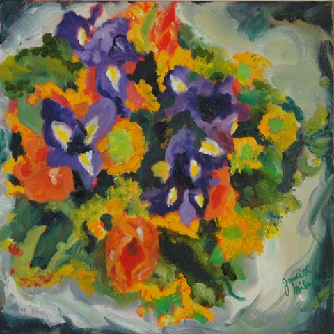 flowers gathered in paper, oranges, purples, greens, square foot