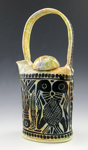 African carving inspired teapot