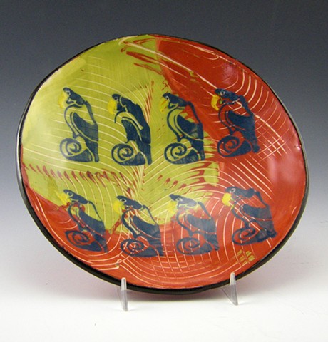 parrot design bowl in red, yellow and black