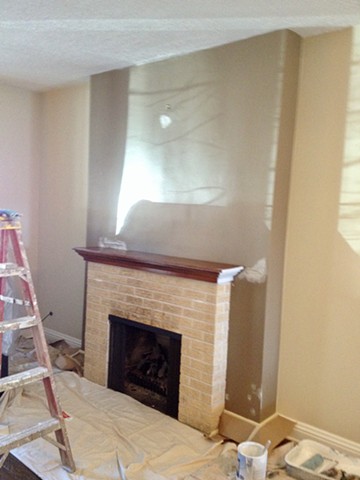 Brick fireplace and mantle before