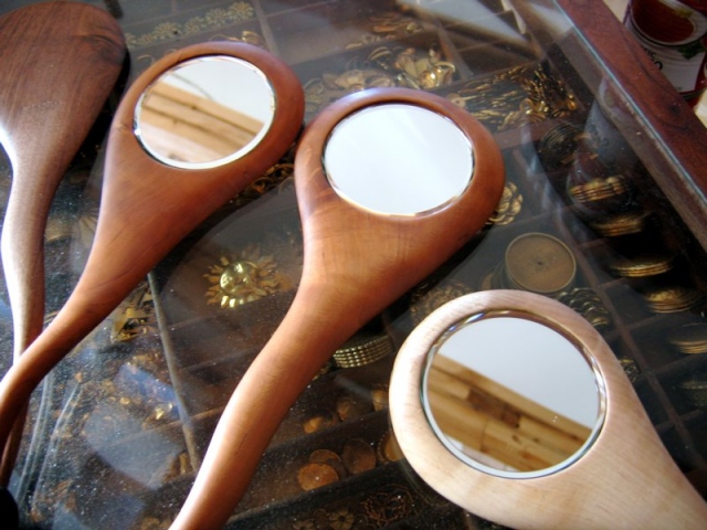 sculpted handheld beveled mirrors Cherry,Walnut, Maple, turned finials in various combinations (can be made to order)