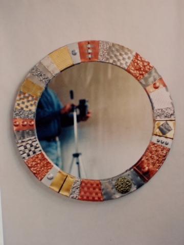 round mirror created with recycled metals hammered, woven using copper, aluminum etc. SOLD