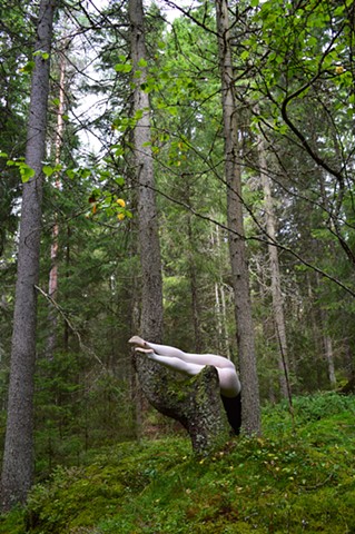 photograph of woman white stockings green forest Sweden by Robyn LeRoy-Evans